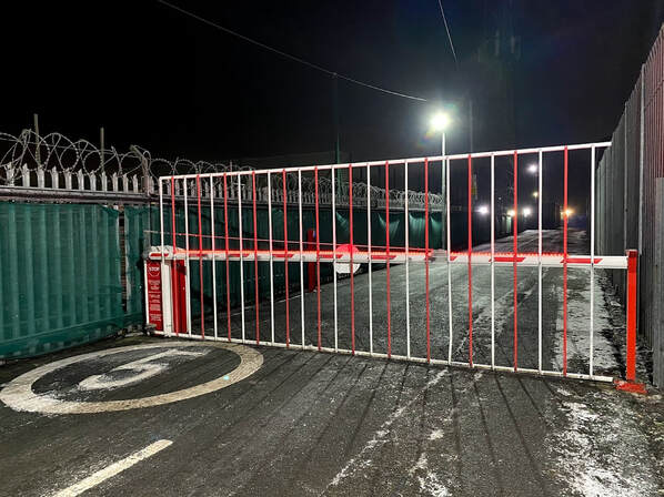 barrier entry system at rome street depot at night